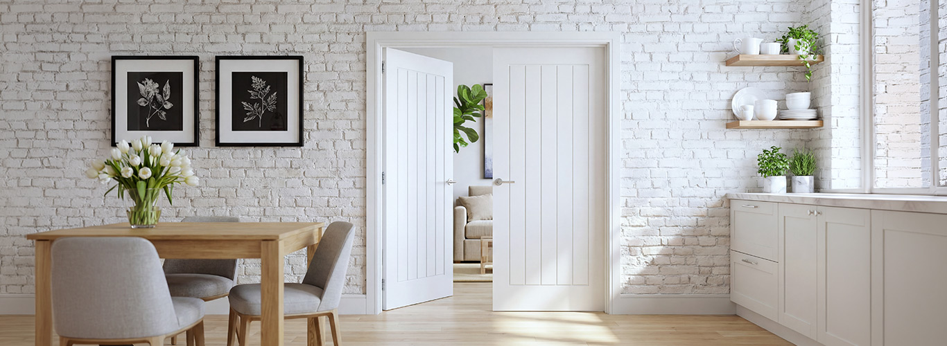 Cheshire Primed White Solid Internal Door in Dining Room Cheshire primed white solid internal door in a bright dining and kitchen space